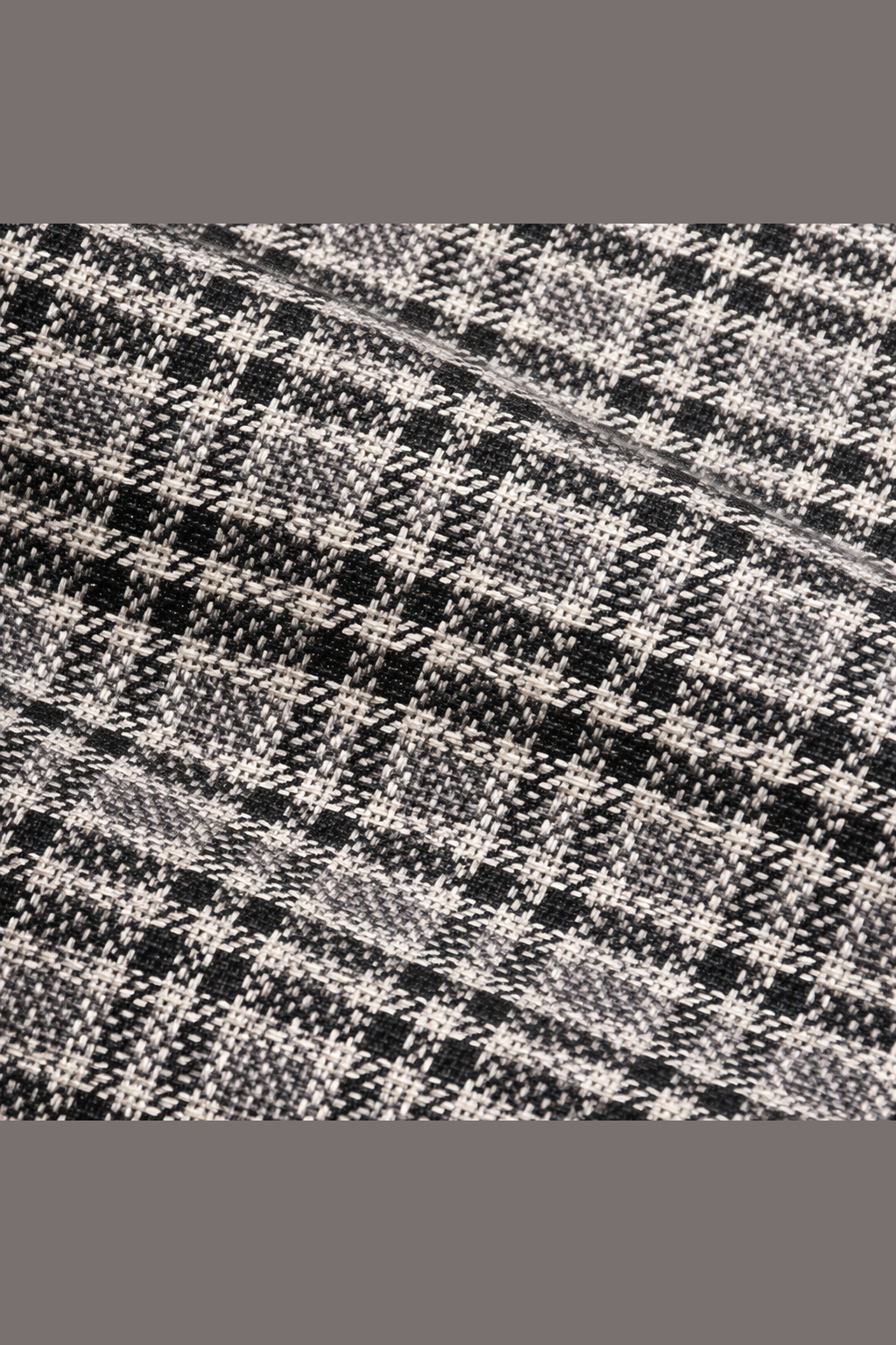 Close-up of a black and white checkered fabric pattern