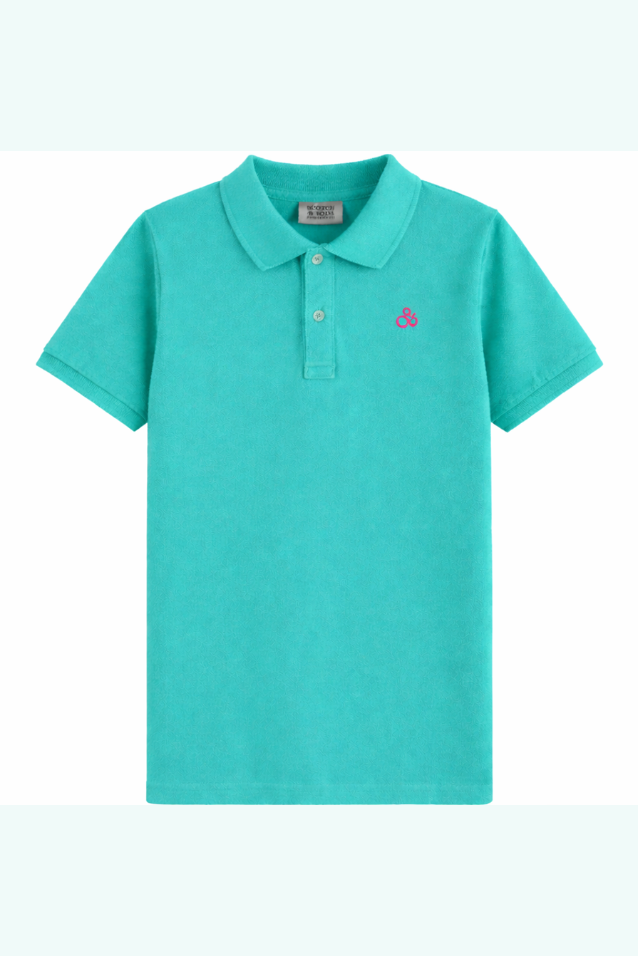 Turquoise polo shirt with a small logo on a light blue background
