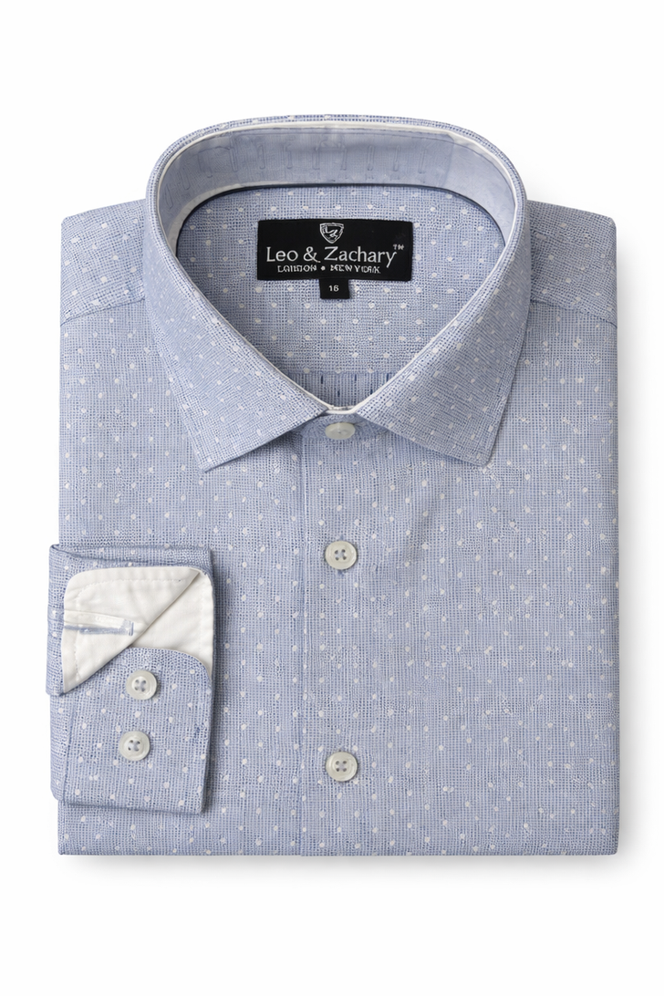 Folded blue dress shirt with white polka dots and 'Leo & Zachary' label on a white background