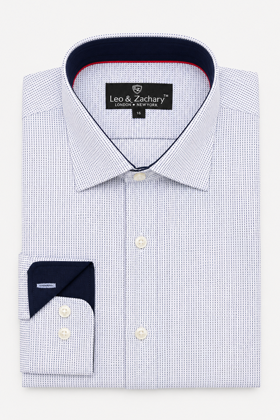 A folded men's dress shirt by Leo & Zachary, featuring a light blue and white micro-check pattern, a dark navy inner collar with red piping, and a matching navy pocket square in the cuff.