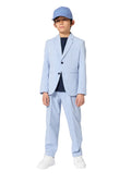 Child wearing a light blue suit and cap on a white background