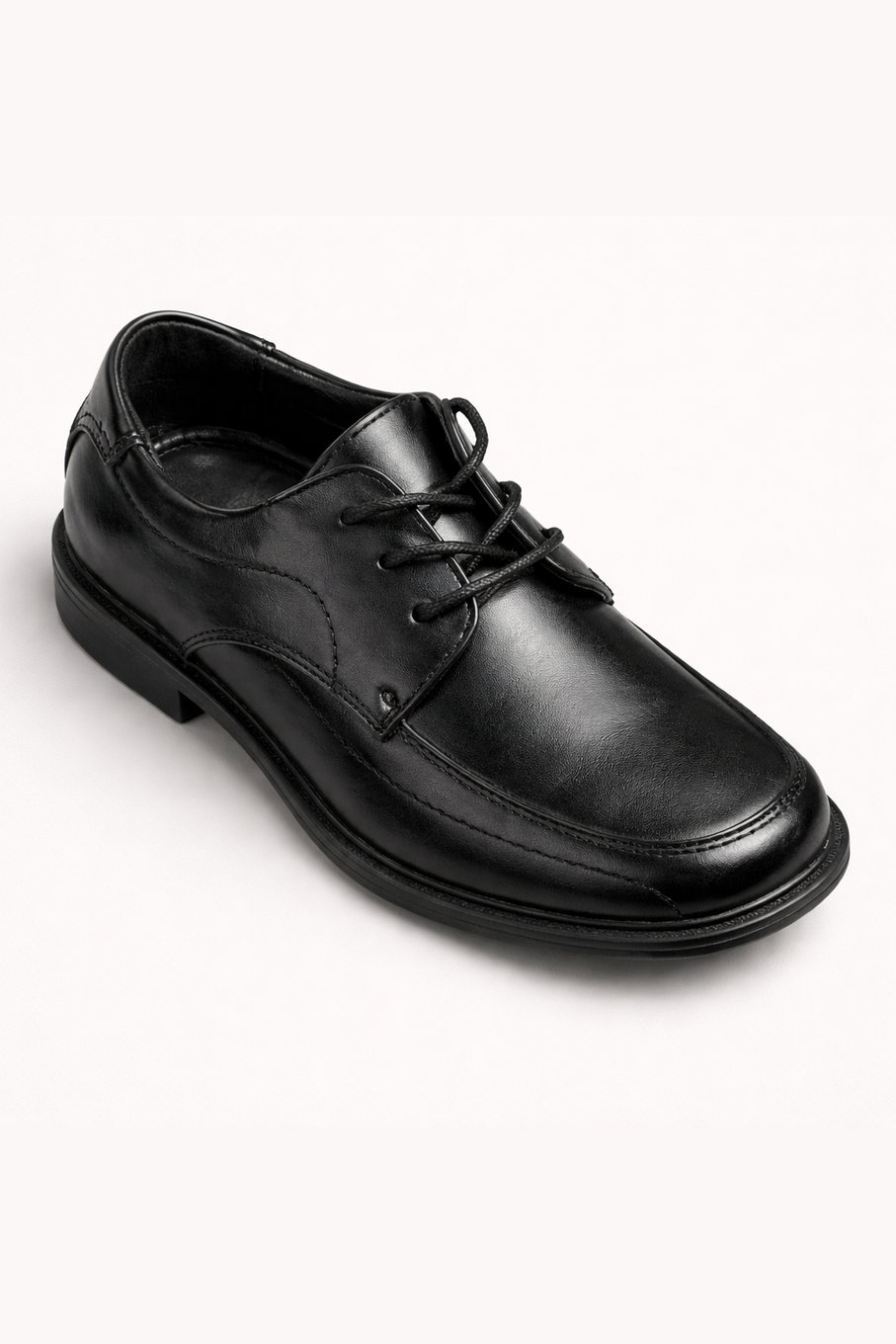 Black leather dress shoe on a white background
