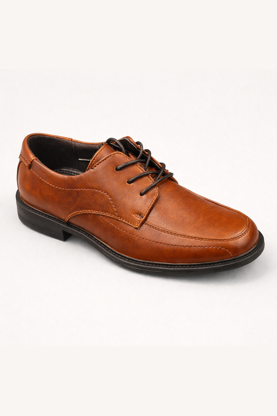 Brown leather shoe with black laces on a white background