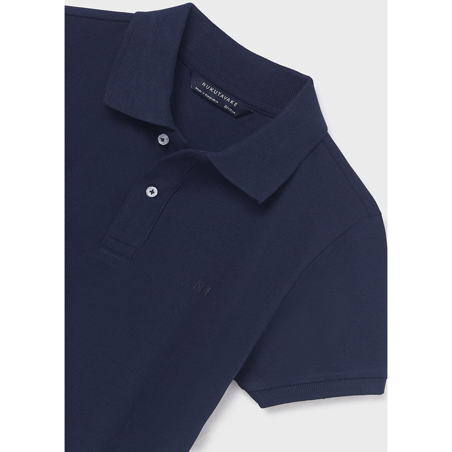 Close up detail of classic short sleeved NAVY Polo shirt. 100% Sustainable cotton