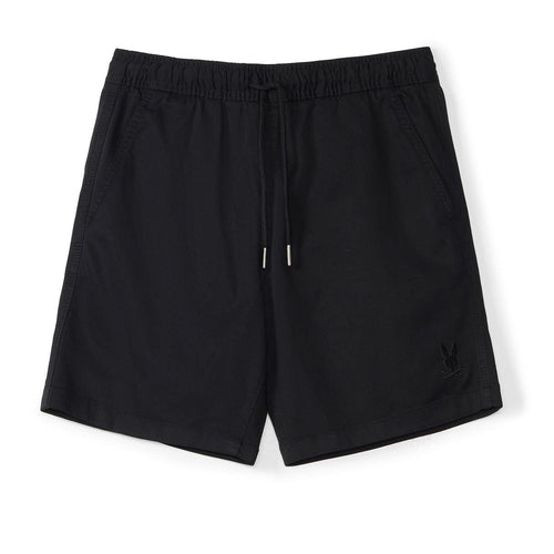 Black shorts with a small logo on a white background